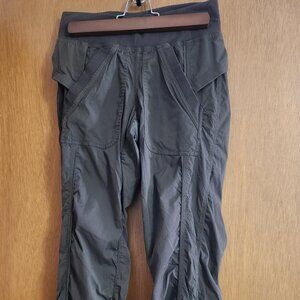 Dark green lululemon studio pants with back pockets